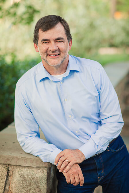 Photo of man smiling outside
